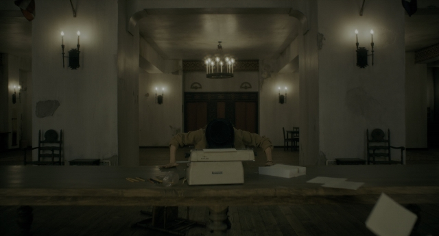 Wide shot frame from Doctor Sleep — sitting, room, table