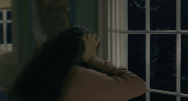 Wide shot frame from Doctor Sleep — standing, night, hair