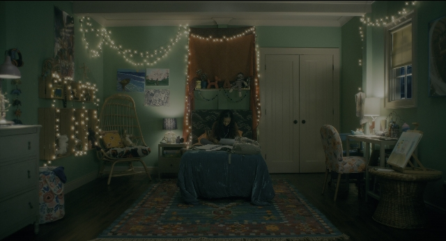 Wide shot frame from Doctor Sleep — sitting, room, table