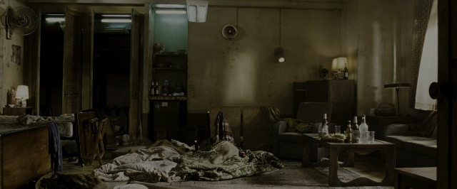 Wide shot frame from The Hangover Part II — room, table, bed
