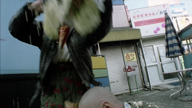 Frame from 964 Pinocchio — standing, street, beard