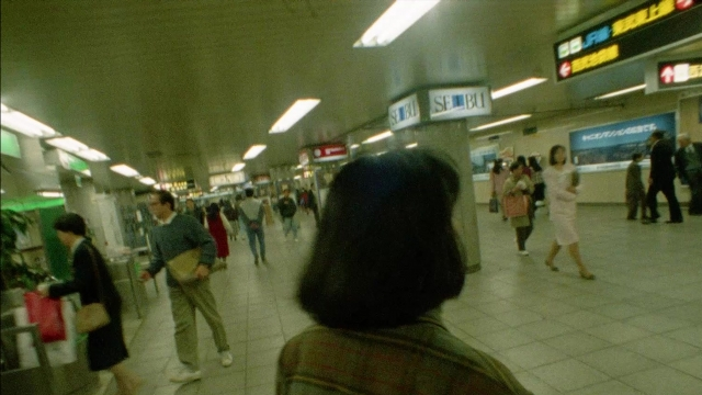 Wide shot frame from 964 Pinocchio — walking, shirt, bird