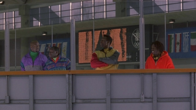 Wide shot frame from Cool Runnings — standing, dialogue, person