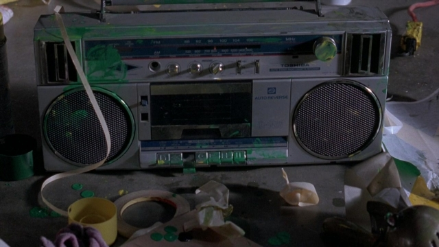 Frame from Cool Runnings — sitting, home appliance