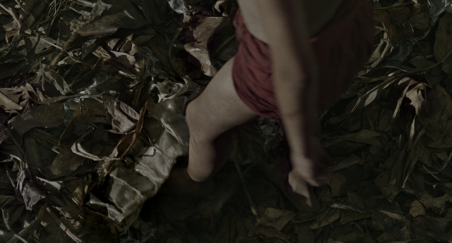 Wide shot frame from The Jungle Book — walking, bed, dress