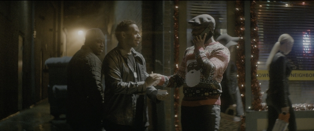 Wide shot frame from The Night Before — standing, walking, dialogue
