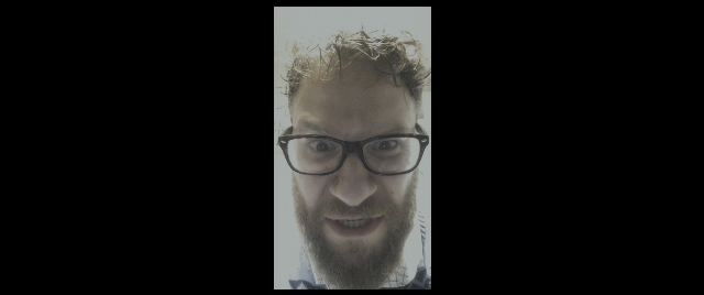Medium shot frame from The Night Before — beard, mustache, face