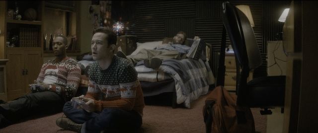 Medium shot frame from The Night Before — sitting, room, dialogue
