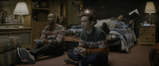 Wide shot frame from The Night Before — sitting, room, bed