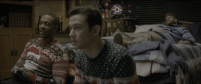 Wide shot frame from The Night Before — sitting, room, bed