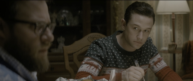 Medium shot frame from The Night Before — sitting, plate, room