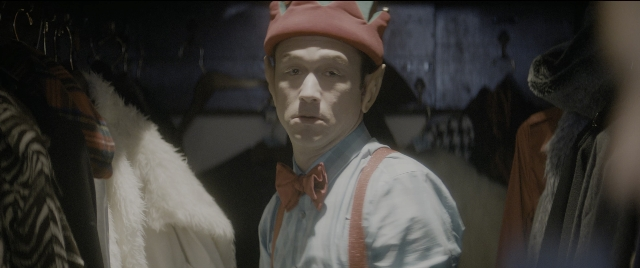 Medium shot frame from The Night Before — hat, tie, shirt