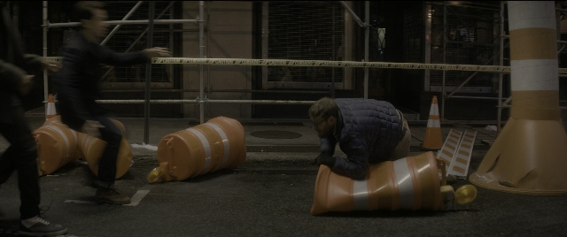 Wide shot frame from The Night Before — walking, street, night