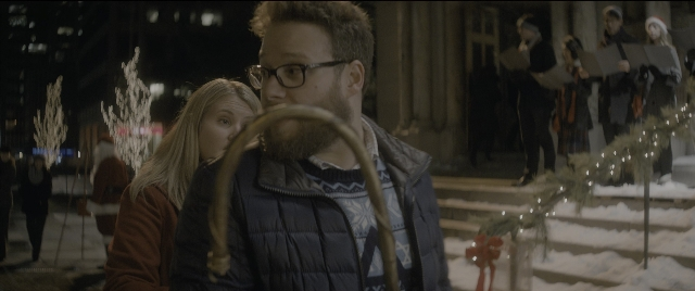 Wide shot frame from The Night Before — standing, walking, street