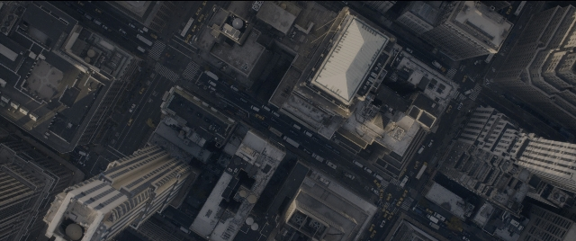 Wide shot frame from The Night Before — office, skyscraper