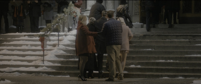 Wide shot frame from The Night Before — standing, walking, dialogue