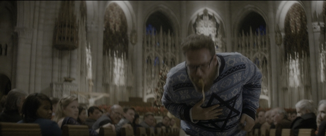 Wide shot frame from The Night Before — sitting, standing, shirt