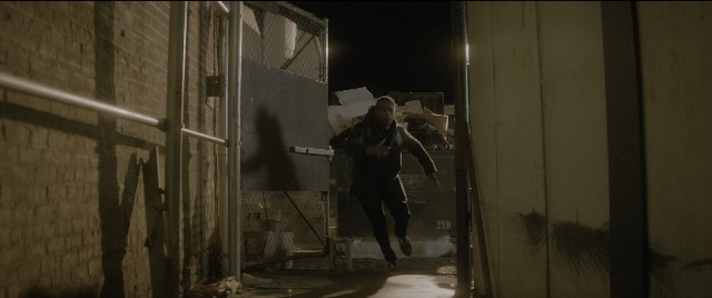 Wide shot frame from The Night Before — night, person, running