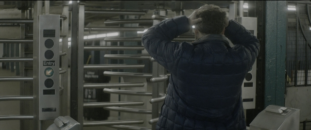 Wide shot frame from The Night Before — standing, face, person
