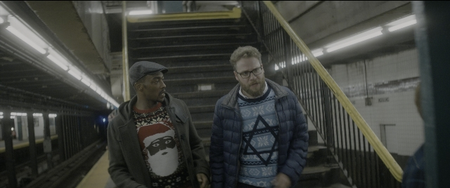 Wide shot frame from The Night Before — walking, dialogue, shirt
