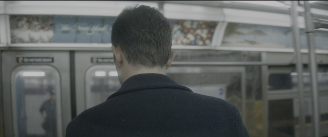 Frame from The Night Before — standing, door, car