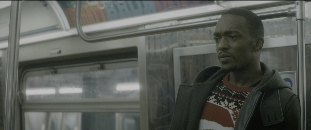 Wide shot frame from The Night Before — standing, face, hair