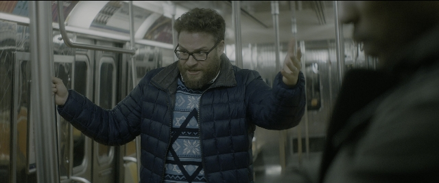 Wide shot frame from The Night Before — standing, beard, face
