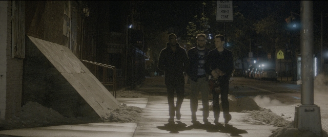 Wide shot frame from The Night Before — walking, street, night