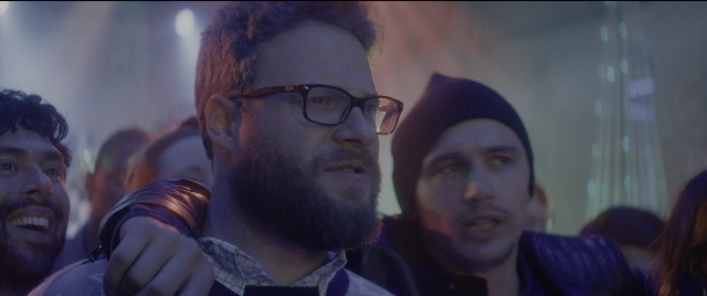 Medium shot frame from The Night Before — room, dialogue, shirt