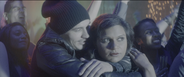 Medium shot frame from The Night Before — hug, hair, person