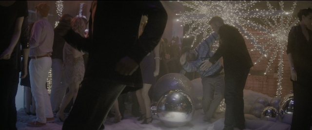Wide shot frame from The Night Before — dialogue, night, snow