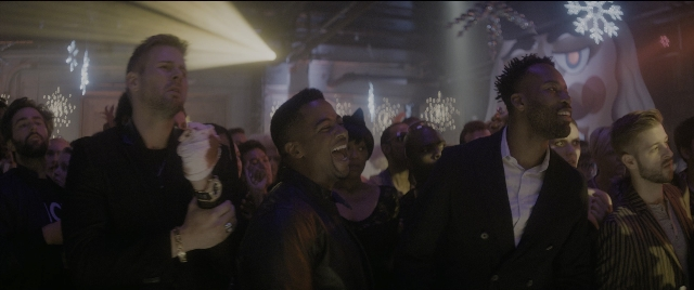 Wide shot frame from The Night Before — dialogue, person, human face