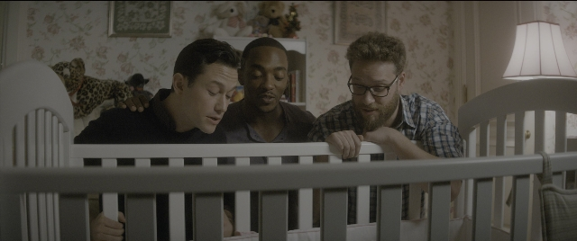 Wide shot frame from The Night Before — standing, room, shirt