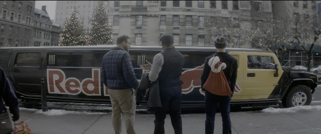 Wide shot frame from The Night Before — standing, dialogue, street