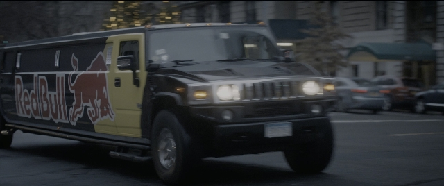Wide shot frame from The Night Before — street, car, night