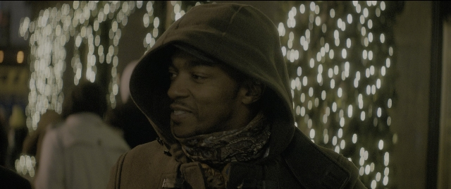 Wide shot frame from The Night Before — standing, walking, street