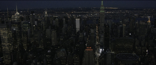 Wide shot frame from The Night Before — night, tower, skyscraper