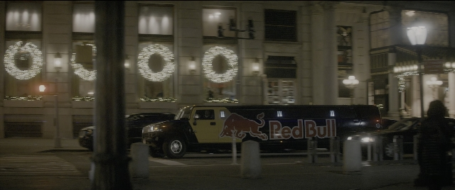 Wide shot frame from The Night Before — walking, street, car