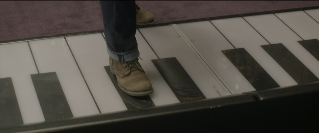 Frame from The Night Before — standing, person, footwear