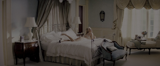 Wide shot frame from The Wolf of Wall Street — room, table, bed