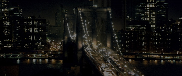 Wide shot frame from The Wolf of Wall Street — night, water, tower