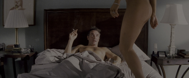 Wide shot frame from The Wolf of Wall Street — room, bed, nightstand