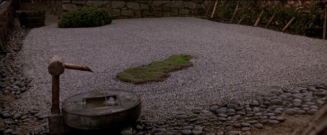 Frame from Black Rain — houseplant
