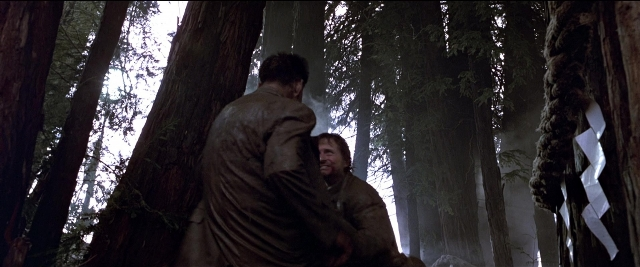 Wide shot frame from Black Rain — standing, dialogue, hair