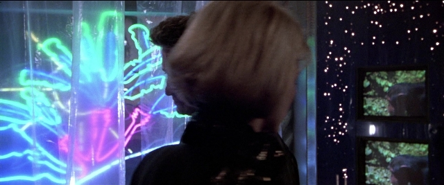Wide shot frame from Black Rain — standing, hair, person
