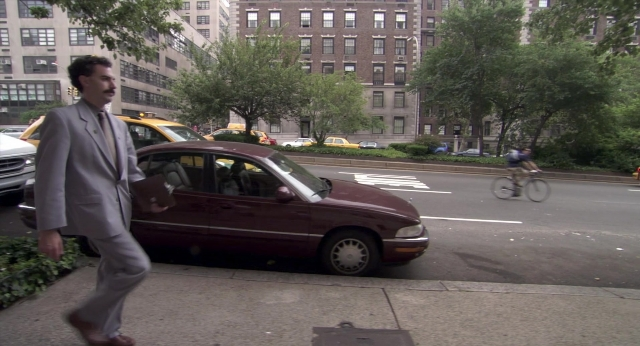 Frame from Borat: Cultural Learnings of America for Make Benefit Glorious Nation of Kazakhstan — walking, street, car