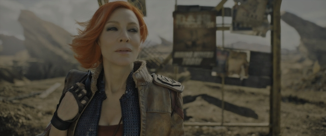 Medium shot frame from Borderlands — standing, jacket, face