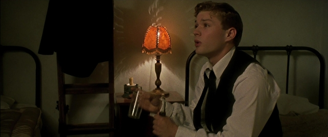 Wide shot frame from Gosford Park — sitting, room, bed
