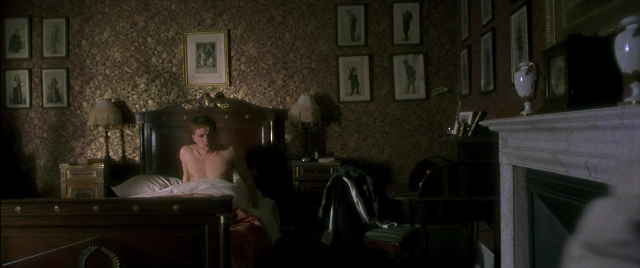 Wide shot frame from Gosford Park — sitting, room, bed