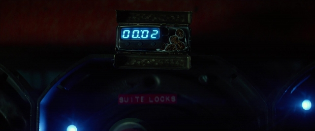 Frame from Hotel Artemis — car, clock, digital clock